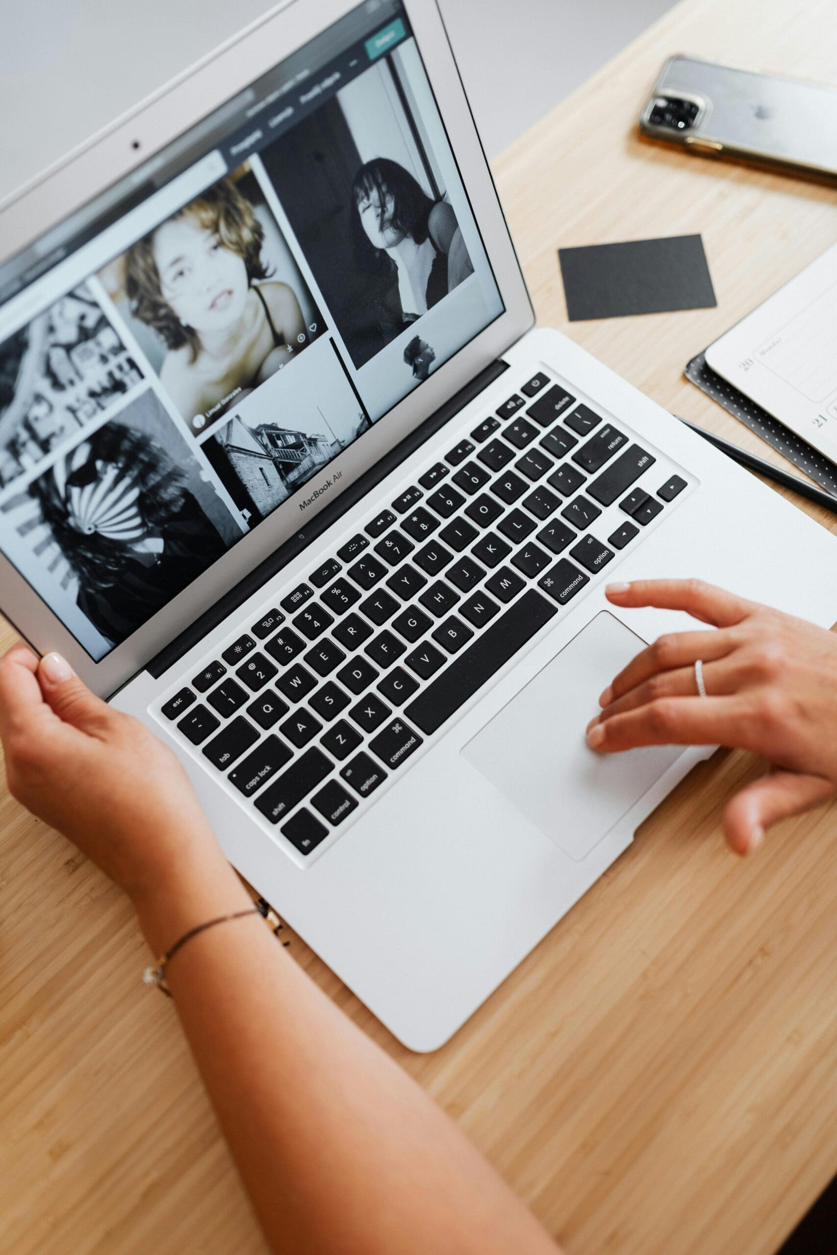 Girl on macbook pro with photography opened